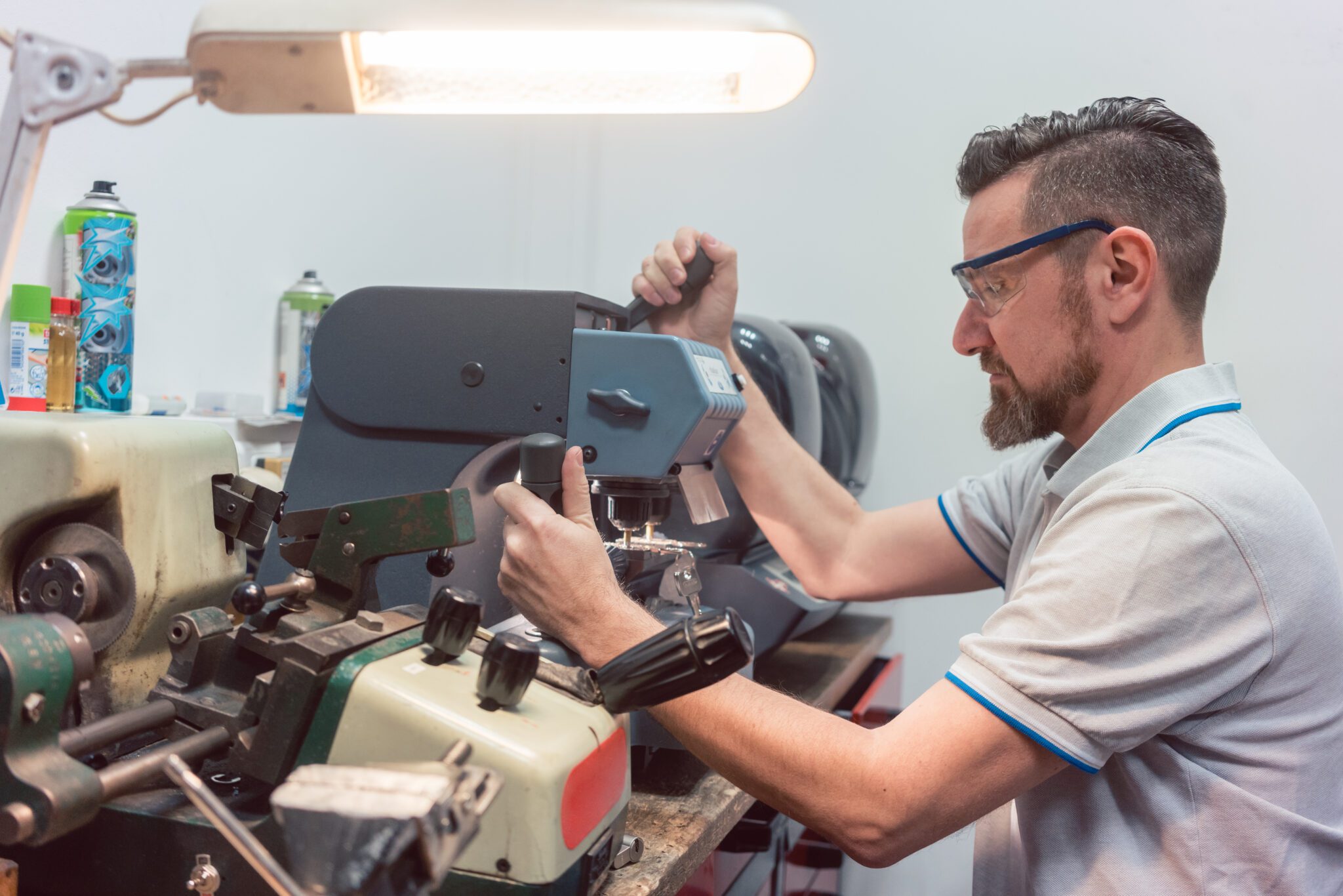 Professional locksmith working on residential hardware